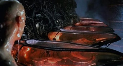 A remote operator's station with VR gear for piloting retail robots.