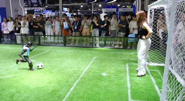 Booster Robotics' Humanoid Shoots, Scores at WAIC 2026